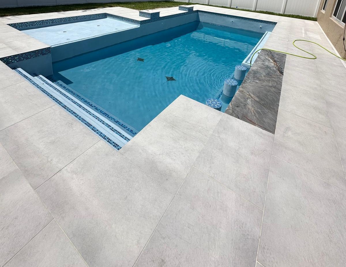 Certified porcelain paver pool deck installation in Sarasota, Florida