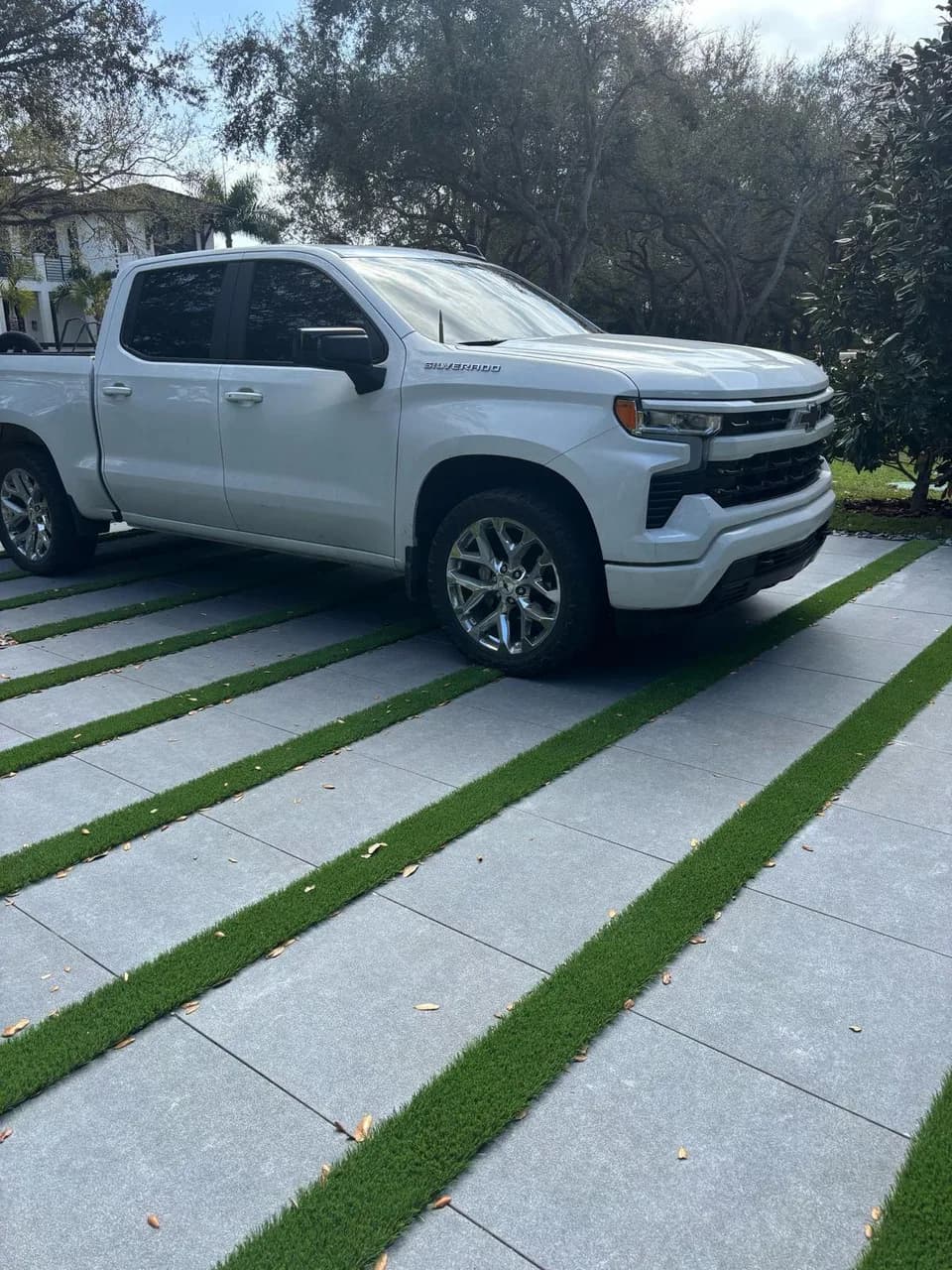 Ancient Grey porcelain pavers installed on a Florida outdoor living space by EC Paver Solutions