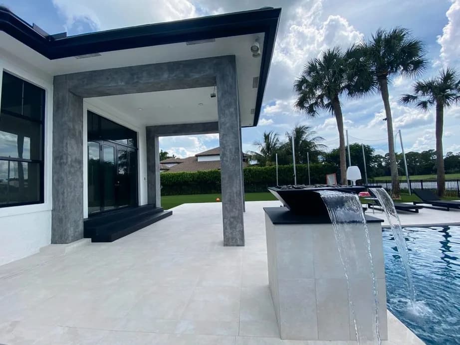 Beach Beige porcelain pavers installed on a Florida pool deck by EC Paver Solutions