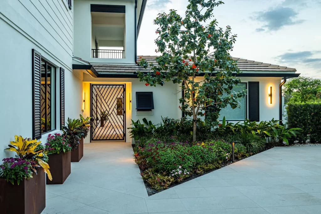 Beach Beige porcelain pavers installed on a Florida outdoor living space by EC Paver Solutions
