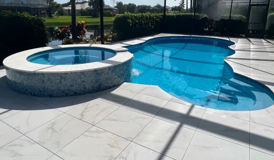 Calacatta porcelain pavers installed on a Florida outdoor living space by EC Paver Solutions