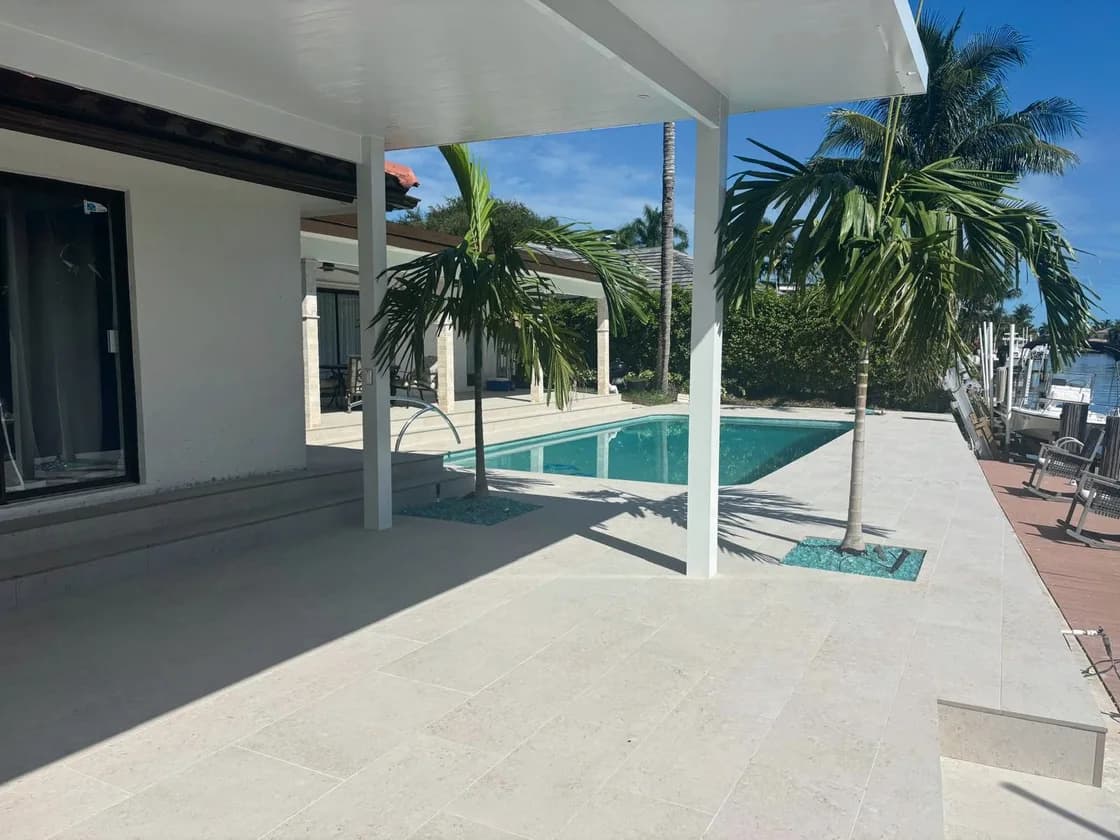 Coralina Bianco porcelain pavers installed on a Florida pool deck by EC Paver Solutions