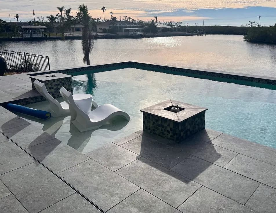 Coraline Grey & Ivory porcelain pavers installed on a Florida pool deck by EC Paver Solutions