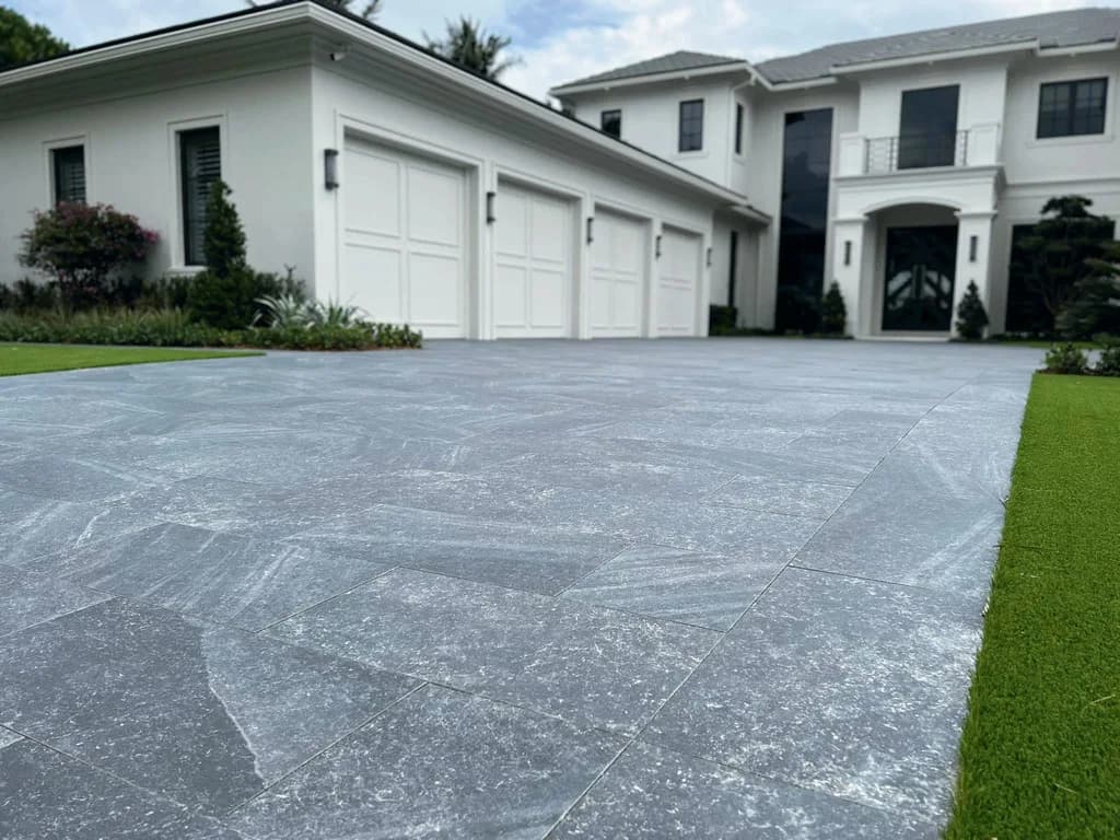 Dark Silver Grey porcelain pavers installed on a Florida outdoor living space by EC Paver Solutions