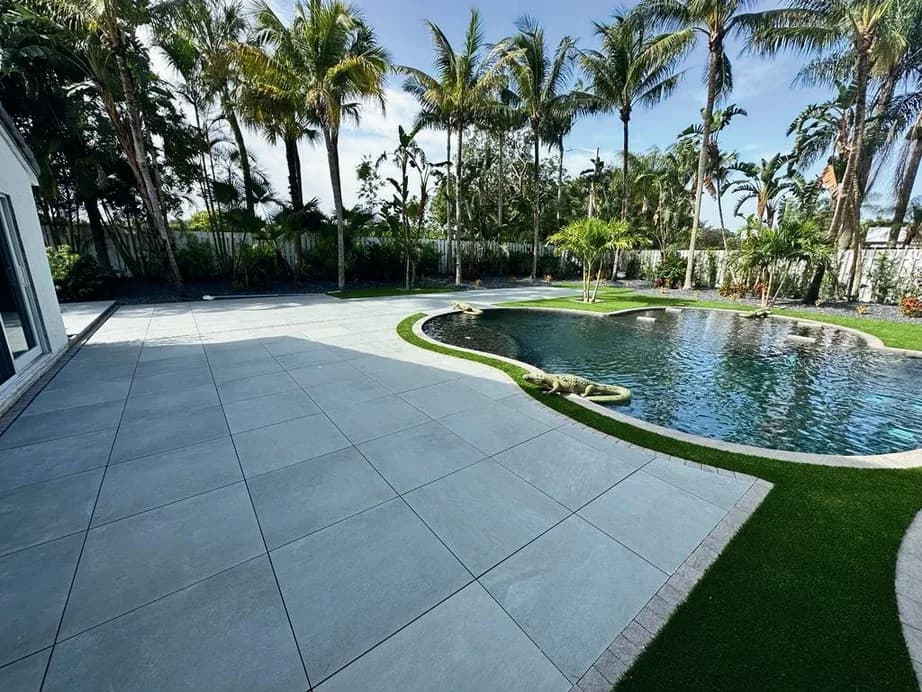 Pietra Blu porcelain pavers installed on a Florida outdoor living space by EC Paver Solutions