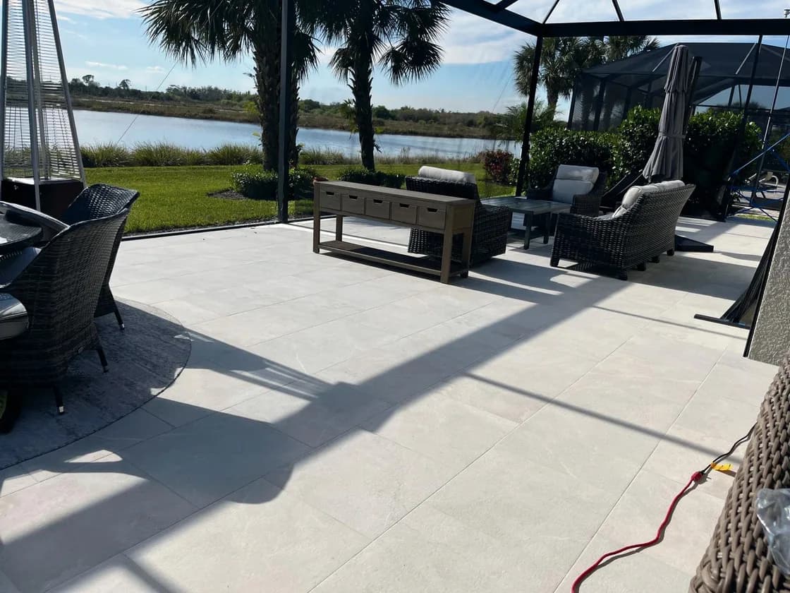 Pietra Reale Crema porcelain pavers installed on a Florida outdoor living space by EC Paver Solutions