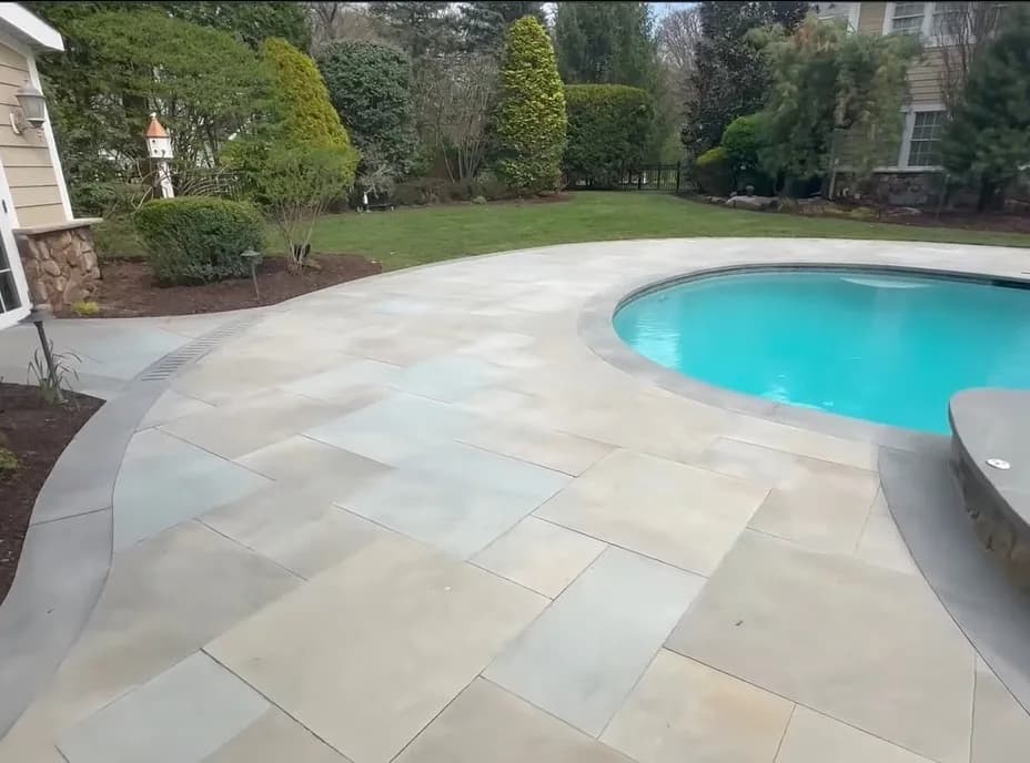Pietra Spaccata porcelain pavers installed on a Florida pool deck by EC Paver Solutions