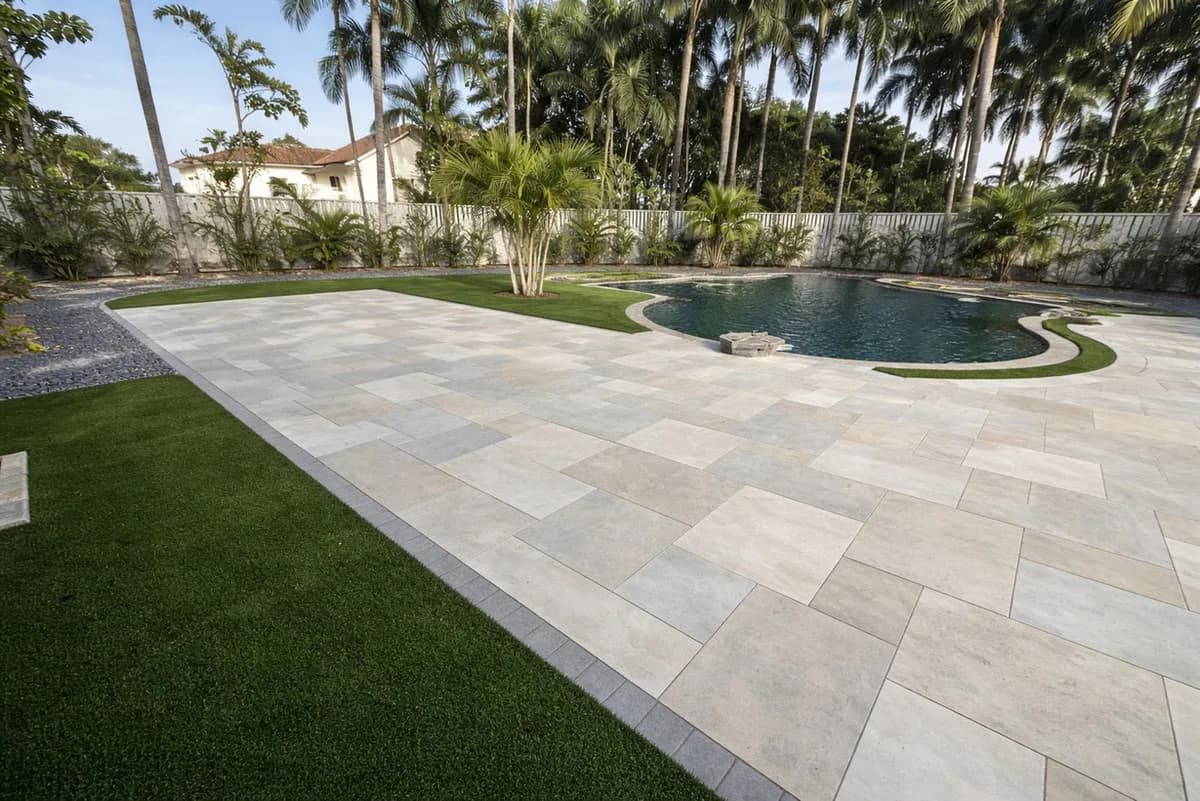 Pietra Spaccata porcelain pavers installed on a Florida outdoor living space by EC Paver Solutions