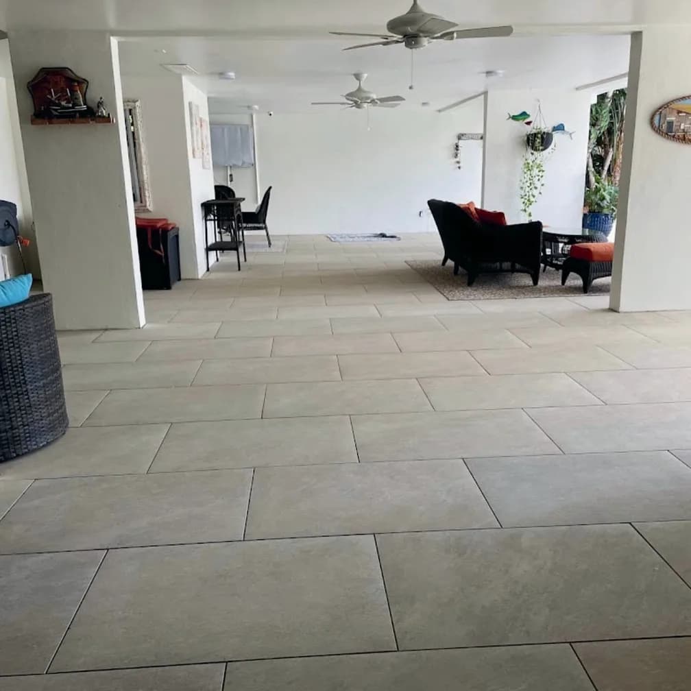 Quartz Beige porcelain pavers installed on a Florida pool deck by EC Paver Solutions