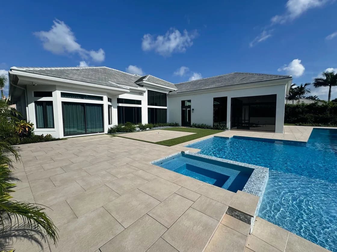 Sandstone Beige porcelain pavers installed on a Florida pool deck by EC Paver Solutions