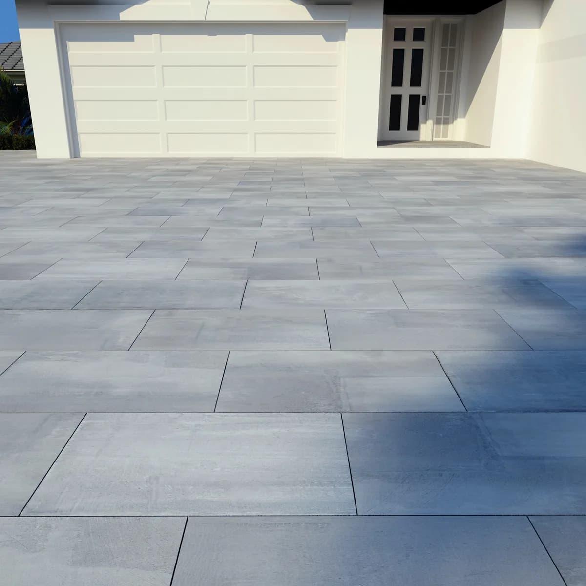 Silver Grey porcelain pavers installed on a Florida outdoor living space by EC Paver Solutions