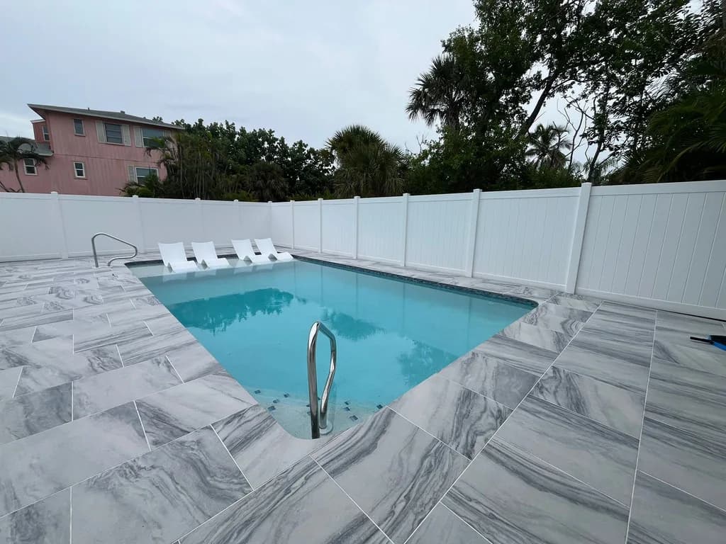 Silver White porcelain pavers installed on a Florida outdoor living space by EC Paver Solutions