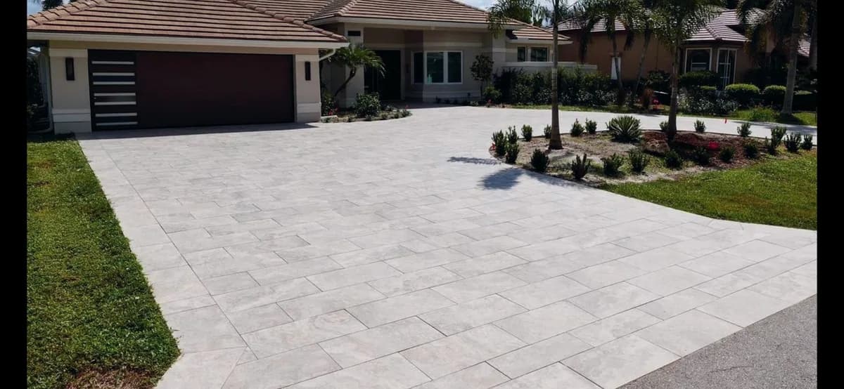 Tuscany Silver porcelain pavers installed on a Florida outdoor living space by EC Paver Solutions