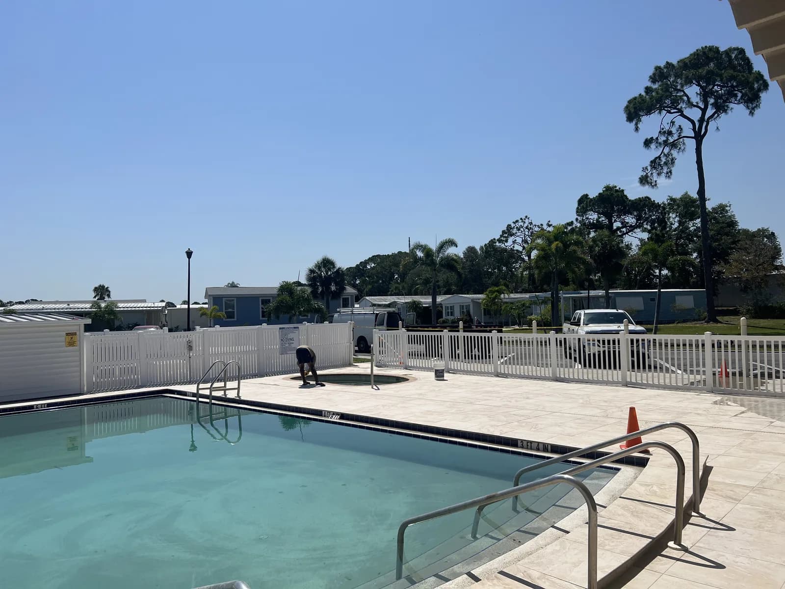 Porcelain paver pool deck on a canal-front property in Florida