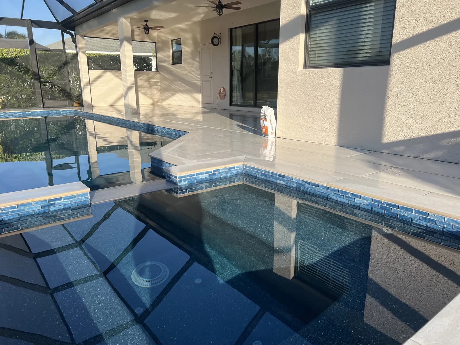 Waterline and deck edge. Drainage is decided here, and drainage is the single largest cause of failure.