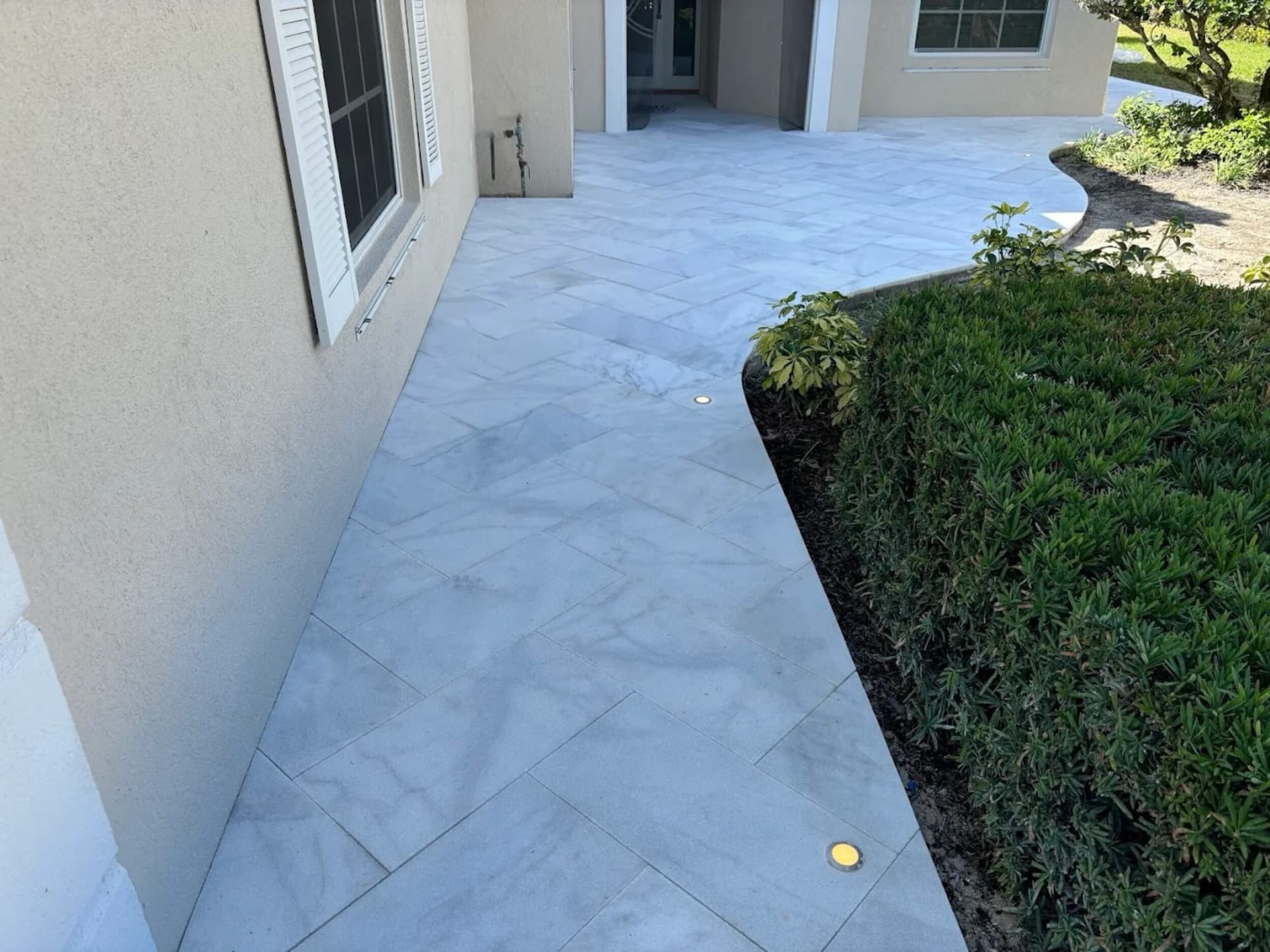 Travertine paver installation Florida — EC Paver Solutions pool deck